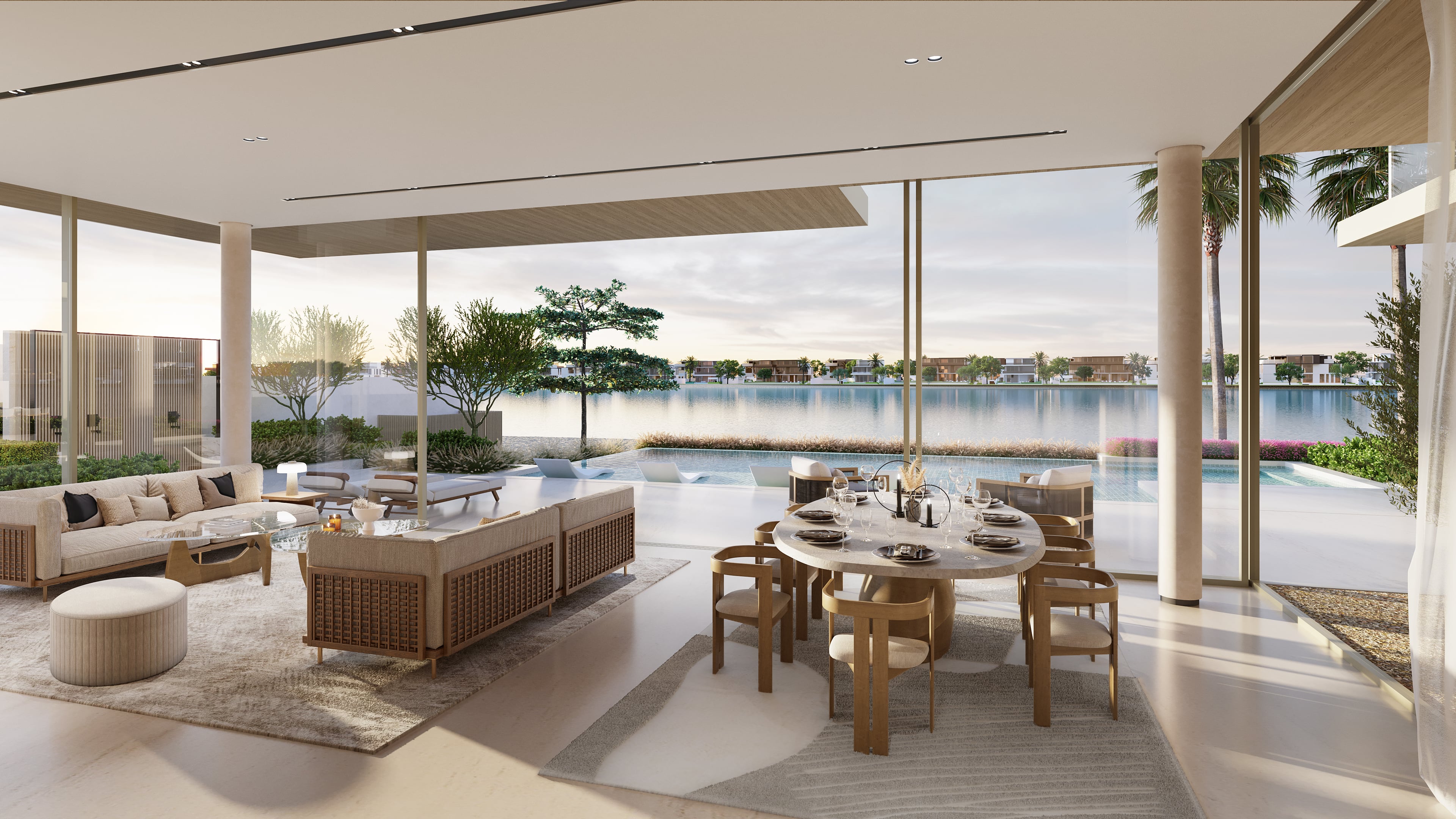 A luxurious living space featuring a designer table and chairs, bathed in warm light from a chandelier, with a breathtaking vista of a lake.