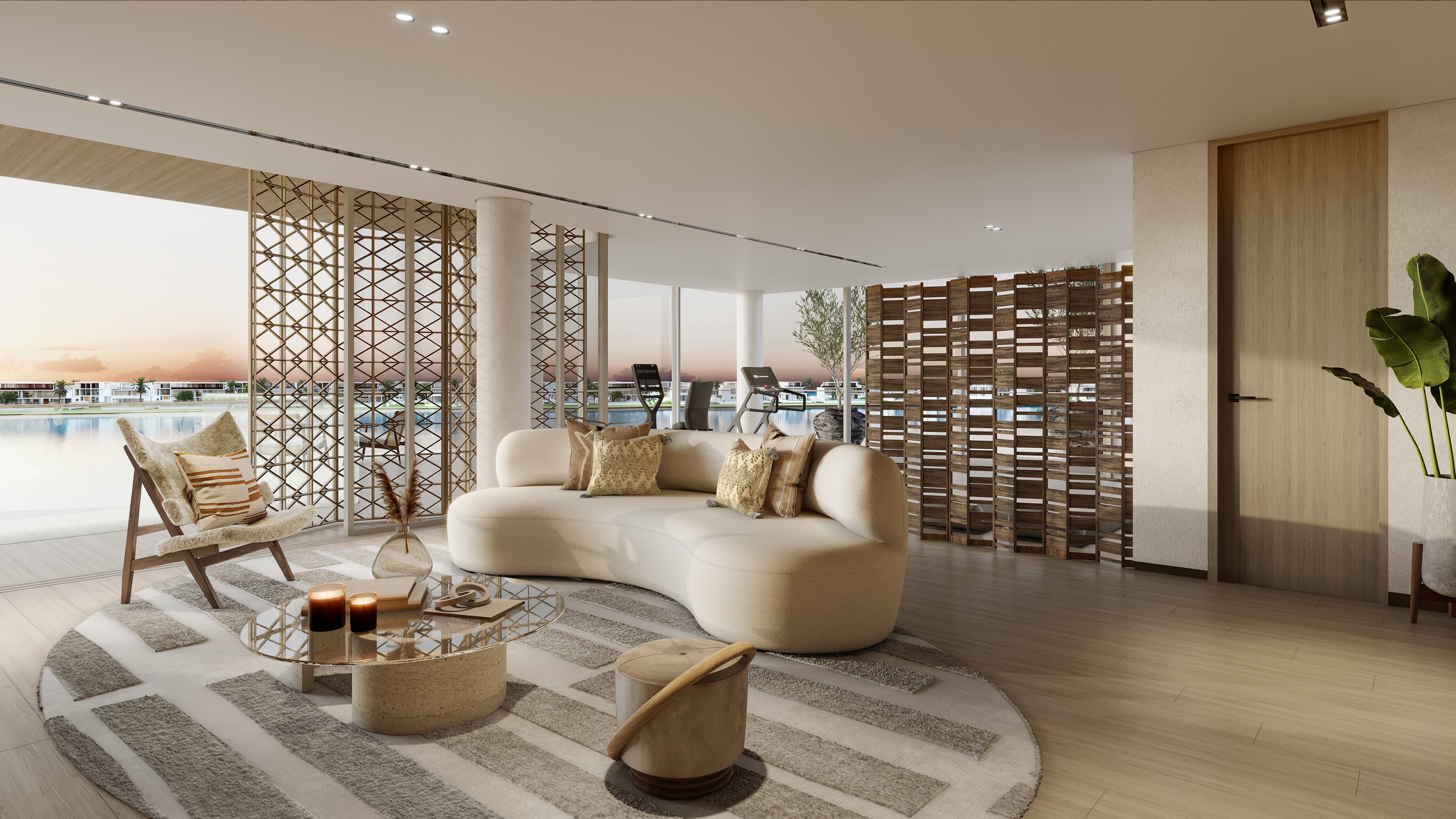 A luxurious bedroom with a balcony offering a scenic view of the sea.
